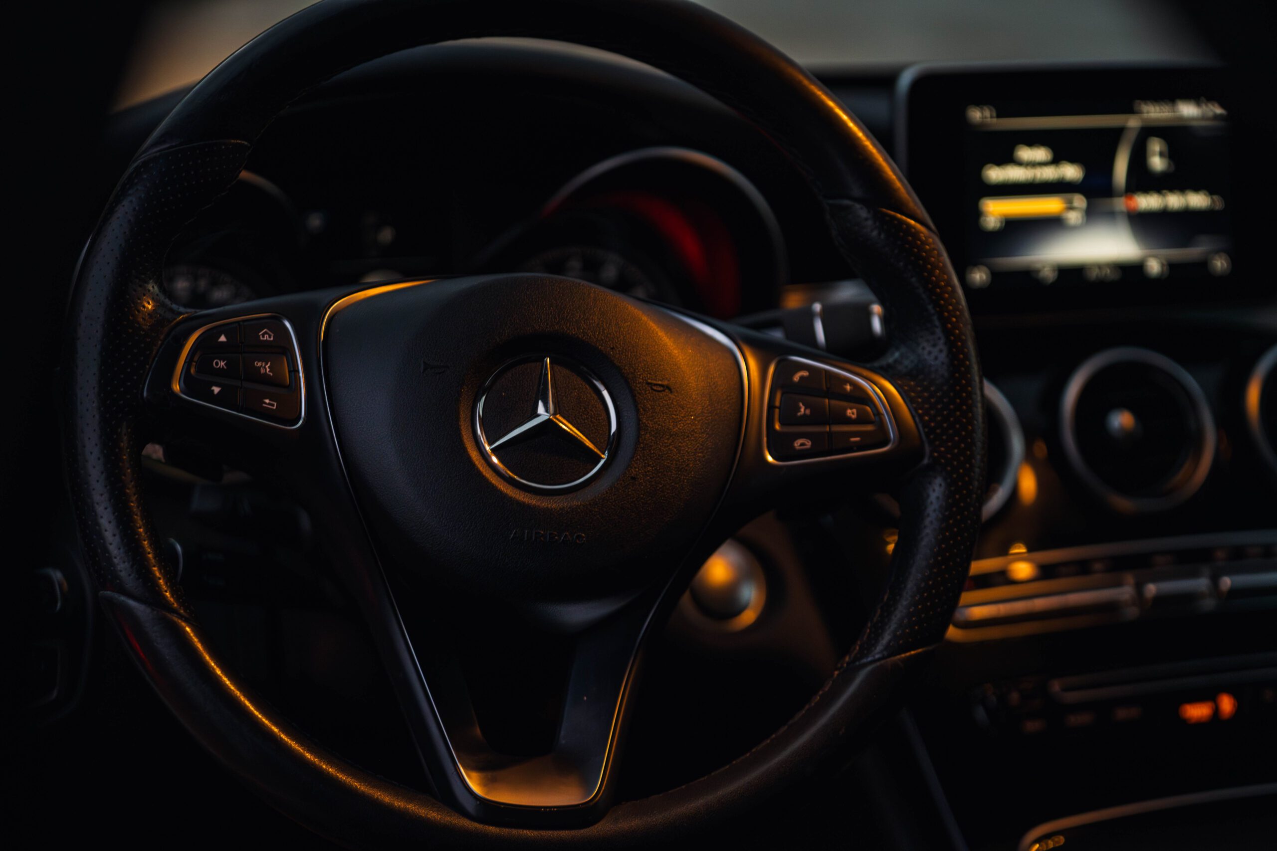 Black benz car on road